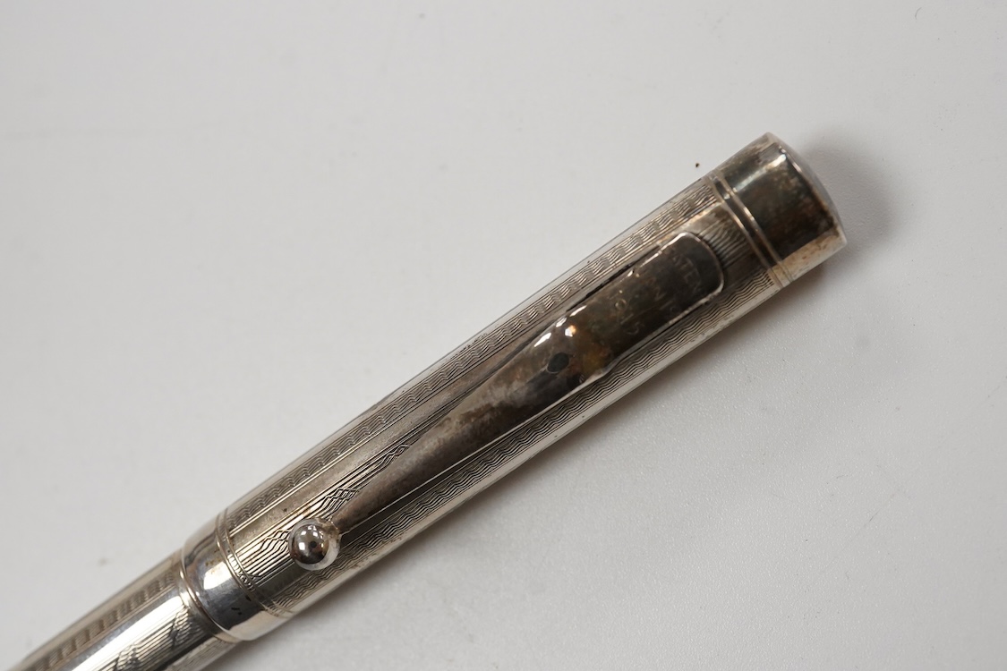 A Mabie Todd & Co. Swan Sterling silver lever filler, Made in USA with 14ct. flexible nib